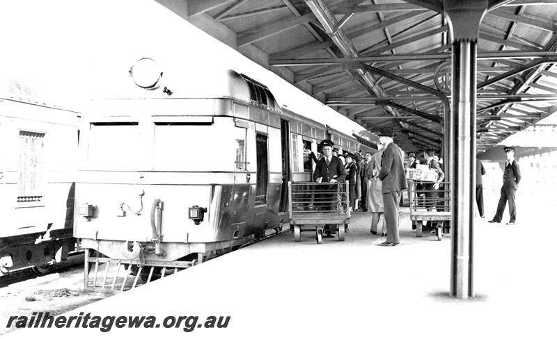 P07182
ADE class, Perth Station, loading goods and passengers, front and side view.
