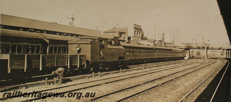 P07238
N class loco coupled to a R class wagon, Perth Station looking east
