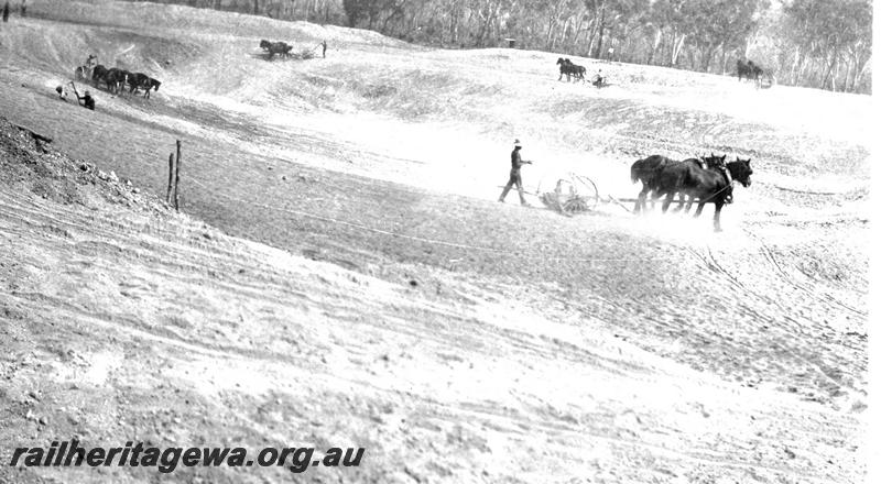 P07314
10 of 32 photos of the construction of the railway dam at Hillman, BN line, excavation in progress with horse drawn scrappers
