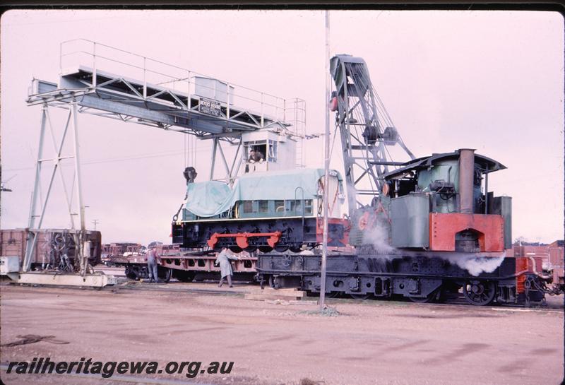 P07756
T class 1801, Parkeston, being unloaded from standard gauge wagon on delivery by Crane No.23, rear view of crane
