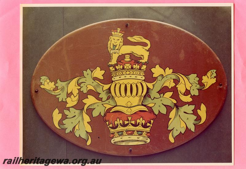 P07787
Royal coat of Arms painted onto a wooden roundel from the visit of the Duke of Gloucester in 1934
