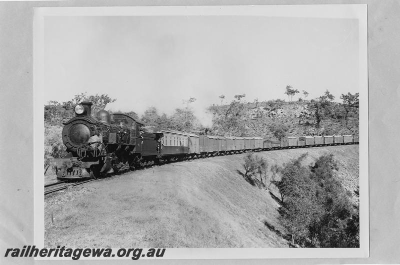 P07829
FS class 418, on deviation east of Swan View, ER line, officials on buffer beam and running board with protection, platform ended carriage behind loco. Testing in progress
