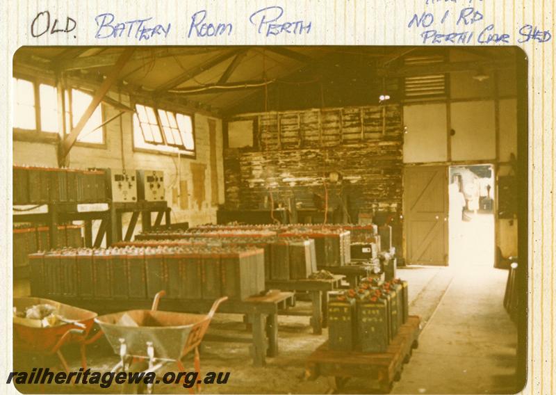P07887
Battery room, Car & Wagon depot, Perth Yard, shows rows of batteries and batteries on trolley of narrow gauge tramway in room

