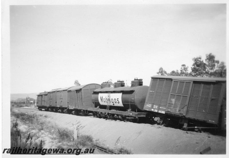 P07948
6 of 6 views of the derailment of No. 30 Goods at Westfield, 29m, 3 ch on the FA line. Shows derailed FD class van and bogie tanker with a 