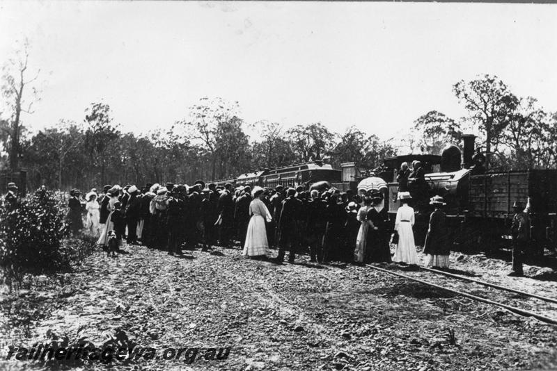 P07966
G class 114, large crowd for the opening of the Jarrahwood-Nannup Railway, WN line, opened by the Colonial Treasurer, Frank Wilson and Sir John Forrest. A special train took guests to Nannup even though public trains had been operating since 26th March 1909.
