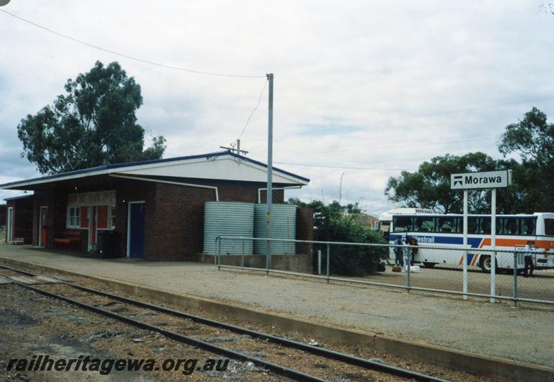 P08604
Morawa, station building, platform, Westrail nameboard, view from rail side, EM line. Railway Road bus visible.

