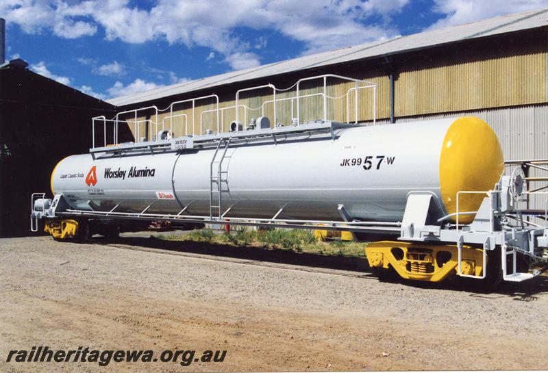 P08967
JK class 9957-W caustic soda bogie tank wagon, newly painted, side and end view. 
