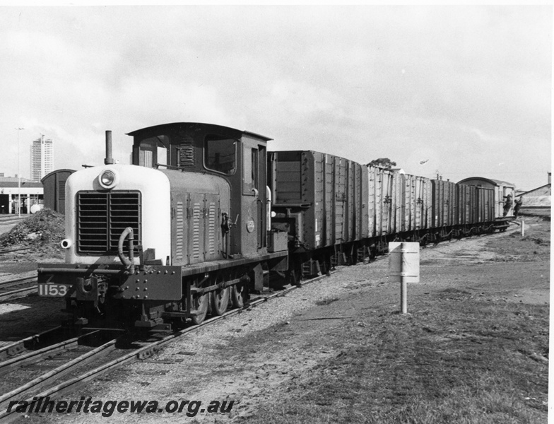 P10318
Z class 1153 in green livery with a train of GH class wagon with coal for the East Perth Power Station, hand pump visible of the side of the loco
