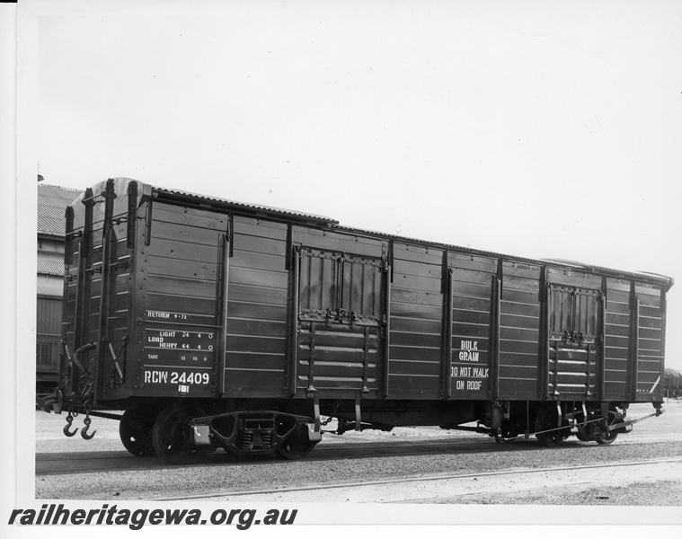 P10934
Side view, at Midland Workshops, of RCW class 24409 high sided open wagon fitted with a roof incorporating sliding sections at either end.
