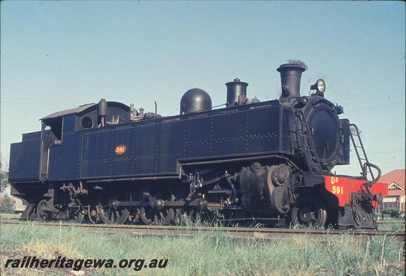 P12146
DD class 591, rods removed, waiting move to Northam, East Perth loco shed. ER line.
