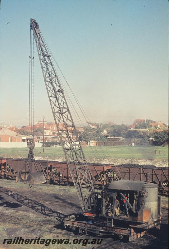 P12150
Steam grab crane, XA class wagons in background, East Perth loco shed. ER line.
