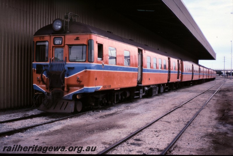 P12867
ADG/V class 618 coupled to other railcars, Claisebrook Railcar Depot, front and side view.
