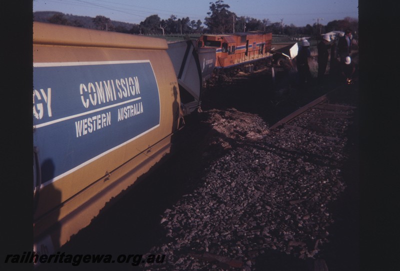 P12887
N class 1880, derailed as the result of a collision with a truck, at Wagerup. SWR line on the 11.9.1981
