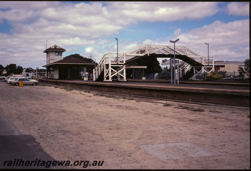 P12892
Footbridge, island platform building, signal box, Subiaco, view from main platform looking towards Perth.
