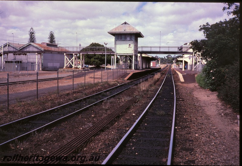 P12893
Signal box, footbridge, goods shed, station building, Claremont, view from west end looking towards Perth.
