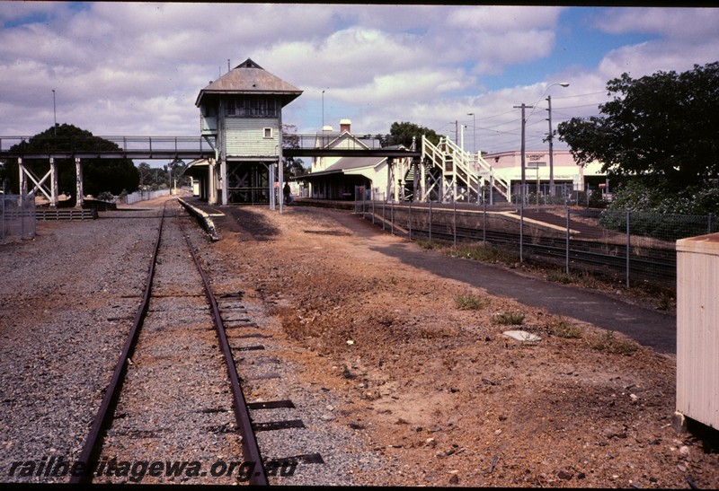 P12894
Signal box, footbridge, station building, Claremont, view from west end looking towards Perth.

