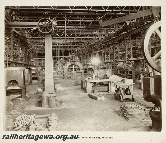 P13373
17 of 67 views taken from an album of photos of the Midland Workshops c1905. Block Two, - Interior Smith's Shop, North Bay, West End.
