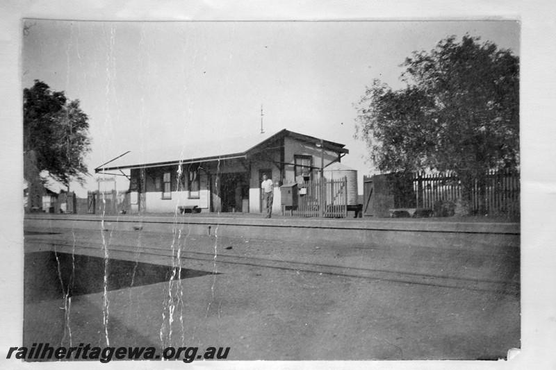 P13557
2 of 6 images of the station buildings and yard at Meekatharra, NR line. Trackside and end view of the station building
