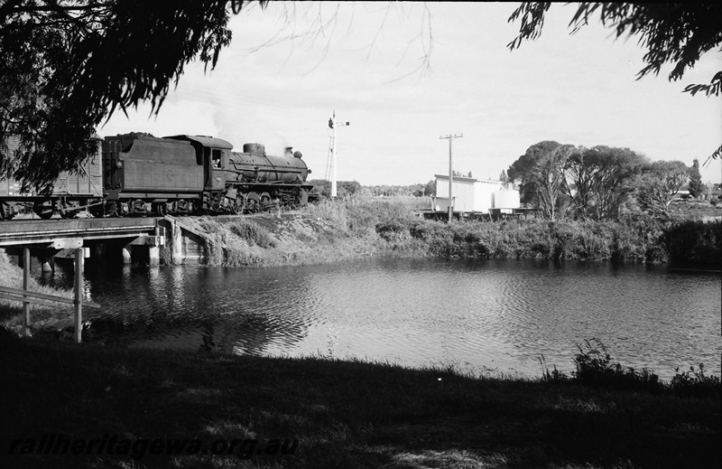 P13955
32 of 32 images of the railway and jetty precincts of Busselton, BB line, W class 942, crossing a trestle bridge, signal, sheds.

