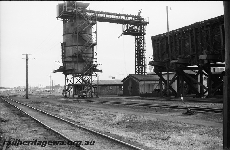 P13973
4 of 17 images of locos, trains and buildings at the East Perth Loco Depot, cylindrical and wooden coaling stages
