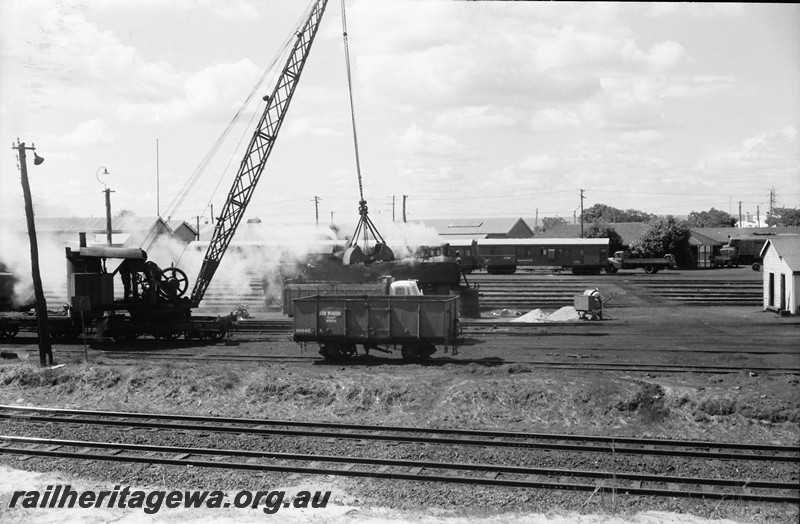 P13976
7 of 17 images of locos, trains and buildings at the East Perth Loco Depot, steam crane loading K class 10842 wagon, wagon stencilled 