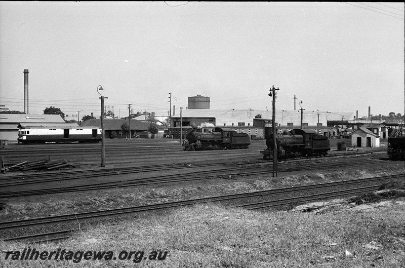 P13980
11 of 17 images of locos, trains and buildings at the East Perth Loco Depot, view across the yard looking east
