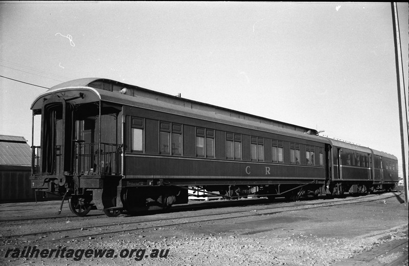 P14004
Commonwealth Railways (CR) wooden sided carriage with a clerestory roof, end and side view.
