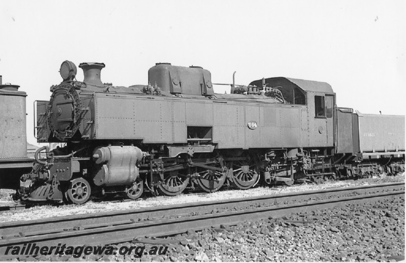 P14222
UT class 664, JY class 1428 bogie tanker built on the underframe of a R class loco, East Perth loco depot, front and side view.
