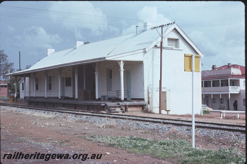 P14333
Station building, end and side view, passenger platform, porter's trolley, relay box, Gingin, MR line.
