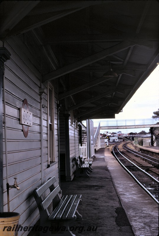 P14377
Station building, platform with seating, footbridge, Subiaco, view along the platform looking east.
