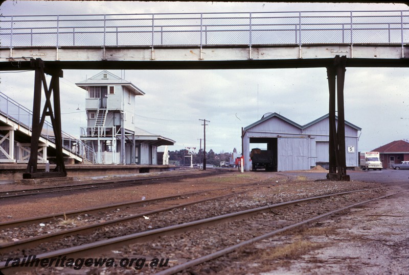 P14380
Footbridge, signal box, goods shed, Subiaco, view looking west down the yard.
