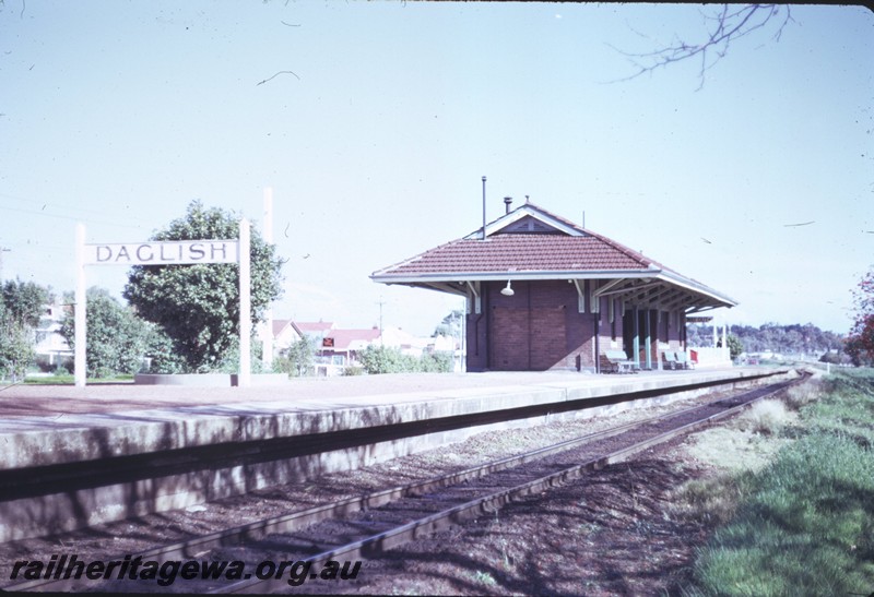 P14384
Nameboard, station building, Daglish, view along the platform.
