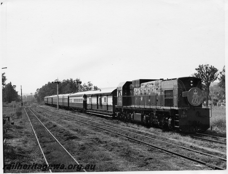 P14680
2 of 3 views of the Royal Train, hauled by long hood leading A class 1511, transporting the Queen Mother to Bunbury, SWR line
