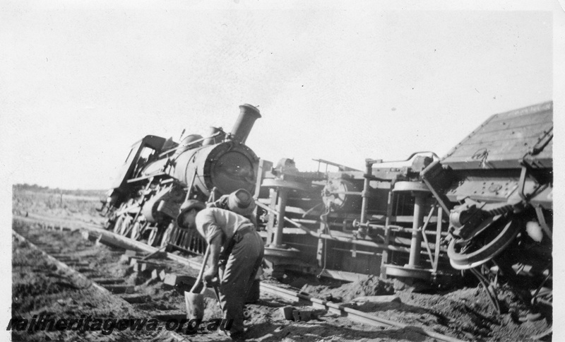 P14743
3 of 3, C class 431 steam loco on AKRU Goods No. 30 derailed near  Gabbin on  21/4/1930,  WLB line, view of the derailed loco and underside of the water tanker and wagon. 

