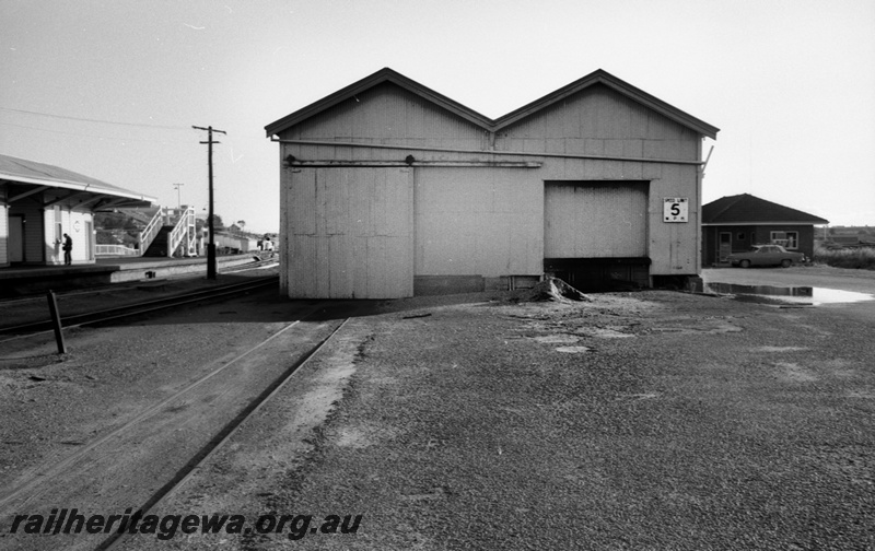 P14805
2 of 21 images of the railway precinct and station buildings at Subiaco, c1969, goods shed, end view, shows the track entering the shed
