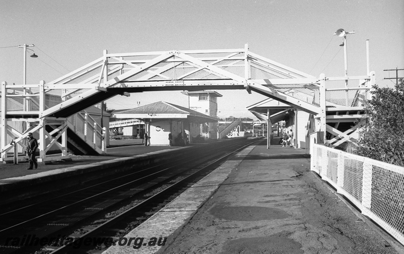 P14811
9 of 21 images of the railway precinct and station buildings at Subiaco, c1969, footbridge, station buildings, signal box, view looking east from west end of the platform
