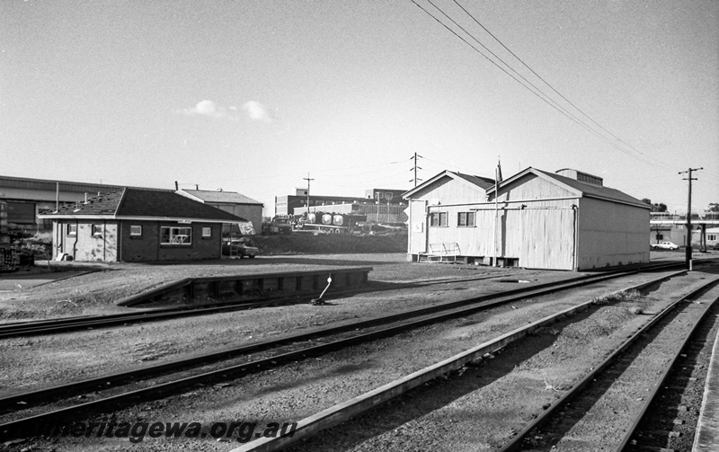 P14815
12 of 21 images of the railway precinct and station buildings at Subiaco, c1969, loading platform, �Little Davids� point lever, goods shed, view across the yard
