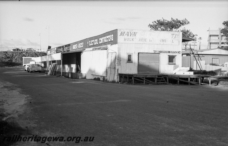 P14816
13 of 21 images of the railway precinct and station buildings at Subiaco, c1969, Mayne Nickless  bulk freight shed, rear and end view
