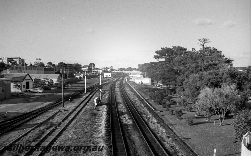 P14820
17 of 21 images of the railway precinct and station buildings at Subiaco, c1969, track, signals, overall elevated view of the yard looking east
