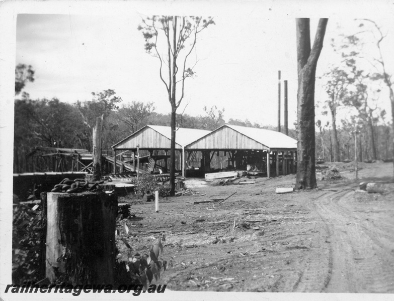 P14927
End view of the mill at Nyamup looking west, Cleared ground in the foreground is for timber stacks.
