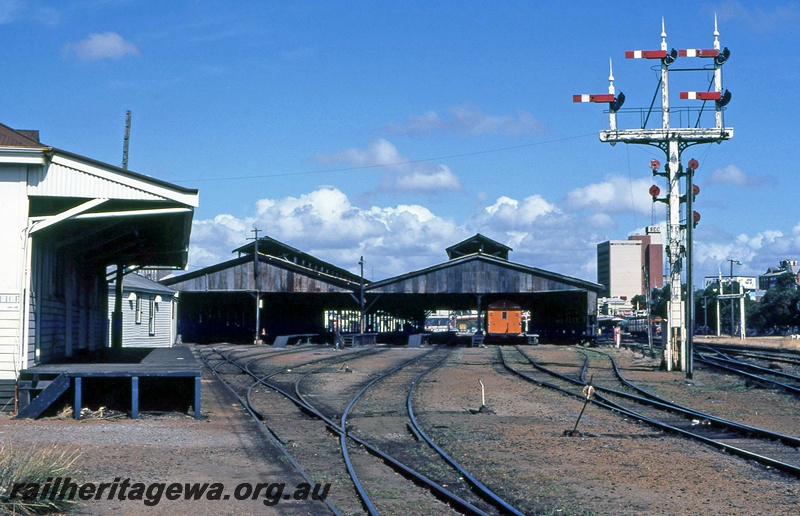 P14946
Four arm bracket signal, carriage sheds, Perth yard, view looking east along the tracks
