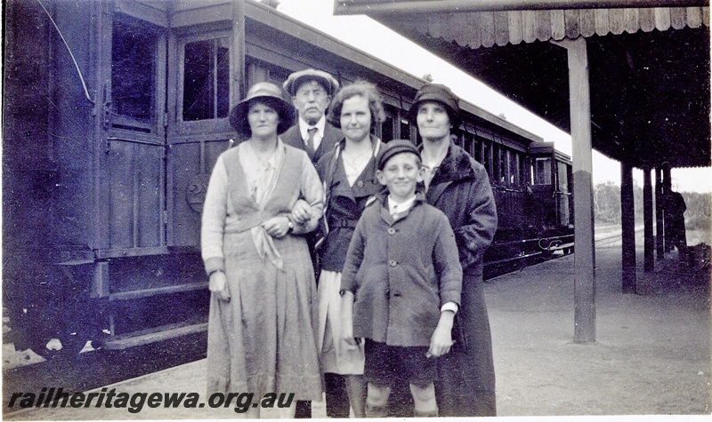 P15130
Station building, Denmark, D line, view along the platform, passenger train at the platform, group photo of locals, names from left to right, Edie Howe, Alf Chapman, Gwen Williams, Ernie Howe & Florence Williams.
