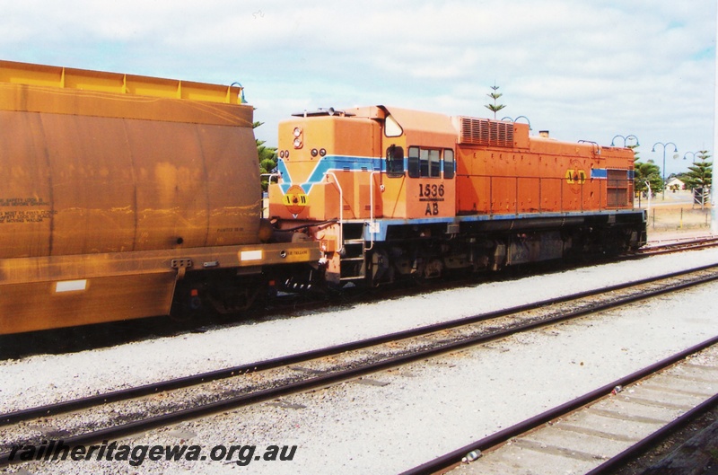 P15282
AB class 1536, in Westrail orange and blue colour scheme but with Australia Western Railroad initials and swan logo, on goods train, Albany, GSR line
