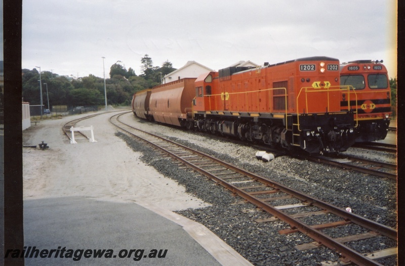 P15285
Australian Railroad Group diesel No 1202, formerly A class 1511, on woodchip train, ARG diesel No 1605, Albany, GSR line
