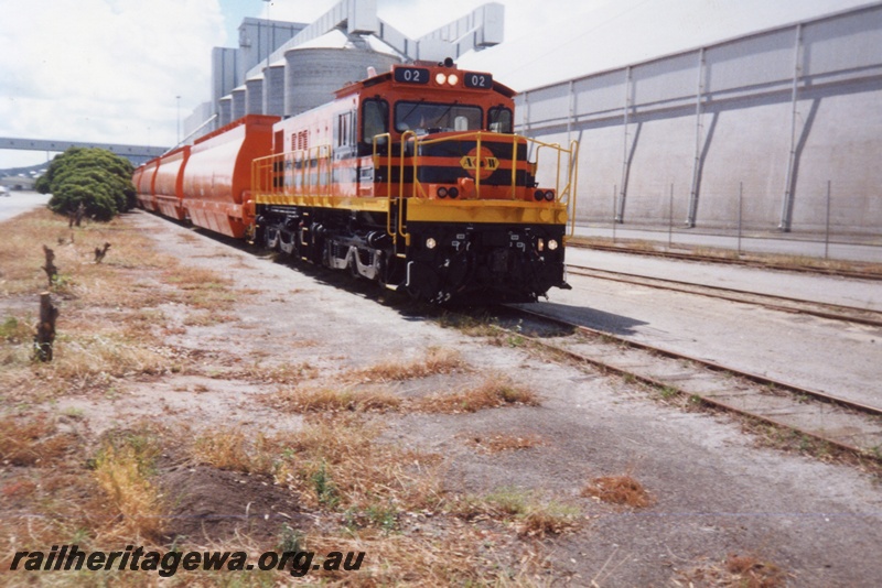 P15293
Australia Western Railroad T class 02 on its first official woodchip train, CBH grain silos, Albany, GSR line, 
