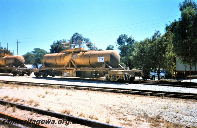 P15603
Australian Western Rail (AWR) WQH class 30026-F acid tank wagon, heavily weathered yellow livery, Kewdale, side and end view
