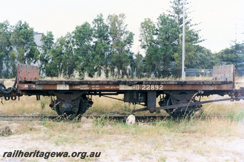 P15738
HD class 22892, four wheel flat wagon with end bulkheads, brown livery, Robbs Jetty, brake lever side view
