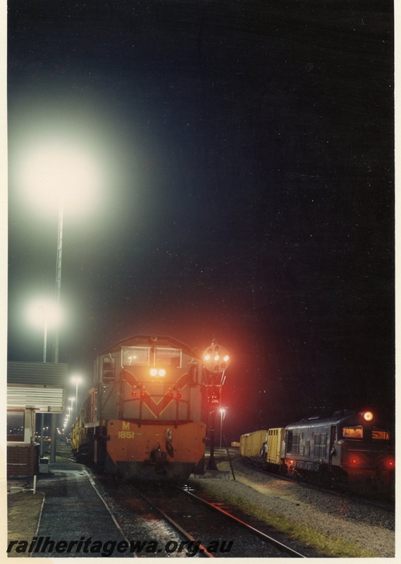P15924
M class 1851, X class diesel, both in green with red and yellow stripe livery, yellow vans, signal lamps, light towers, Forrestfield Hump Yard, at night, side and front views
