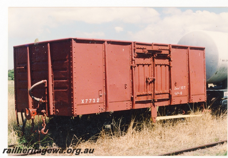 P16122
X class 7732, all steel four wheel open wagon, brown livery, located at the Bellarine Railway, Victoria, end and side view
