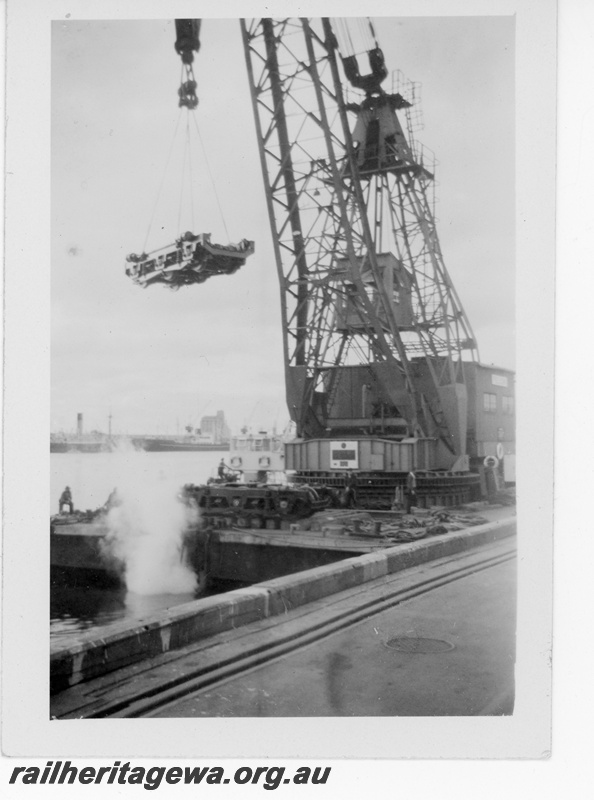 P16124
1 of 6 images of an MRWA F class diesel being unloaded from a ship by the floating crane 